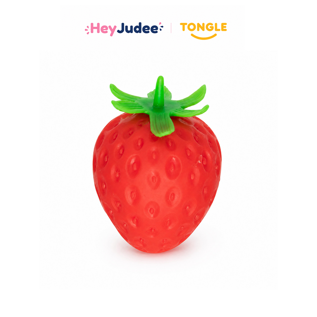 Red strawberry-shaped crunchy squishy toy with green leafy top on white background